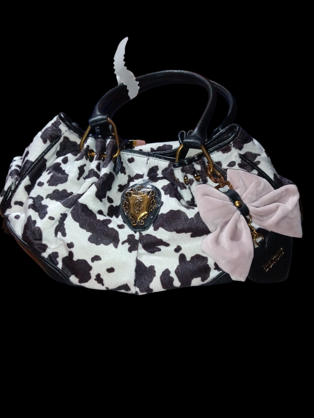 Juicy Couture Black and White Cowhide Satchel with Pink Bow Charm